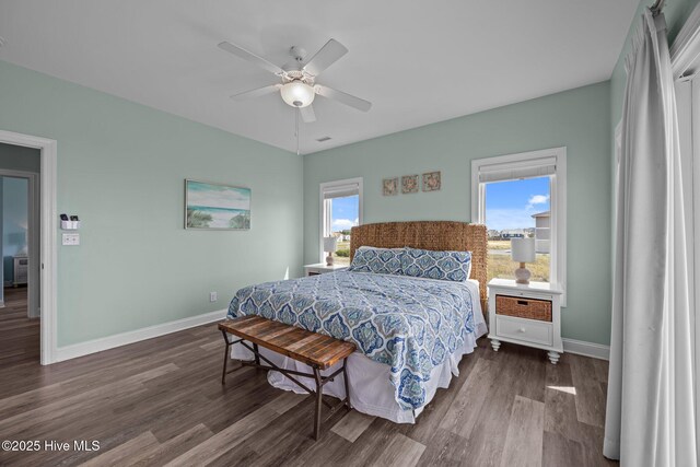 130 N Permuda Wynd Dr, North Topsail Beach, NC 28460 - bedroom with dark wood-style flooring, baseboards, and ceiling fan