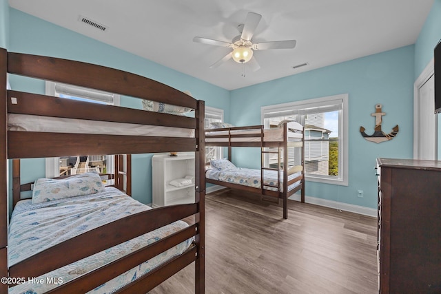 130 N Permuda Wynd Dr, North Topsail Beach, NC 28460 - bedroom featuring baseboards, wood finished floors, and ceiling fan