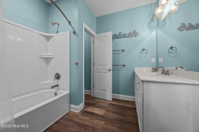 130 N Permuda Wynd Dr, North Topsail Beach, NC 28460 - full bath with shower / washtub combination, vanity, wood finished floors, and baseboards