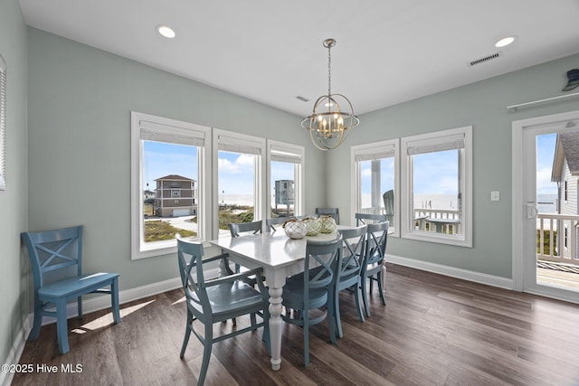 130 N Permuda Wynd Dr, North Topsail Beach, NC 28460 - dining room featuring baseboards, dark wood finished floors, a chandelier, and recessed lighting