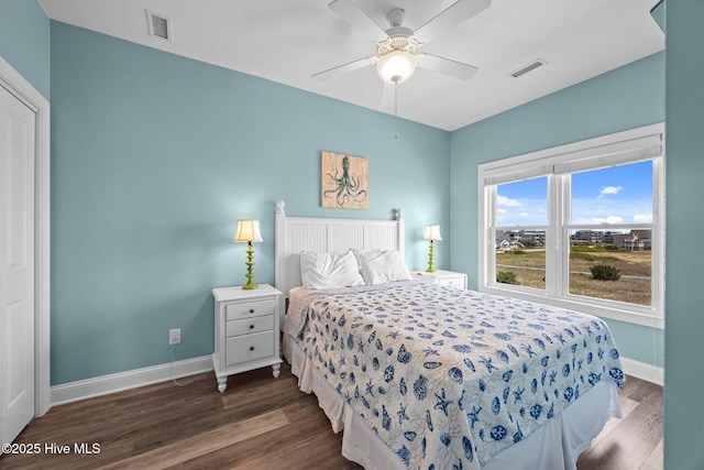 130 N Permuda Wynd Dr, North Topsail Beach, NC 28460 - bedroom featuring baseboards, wood finished floors, and a ceiling fan