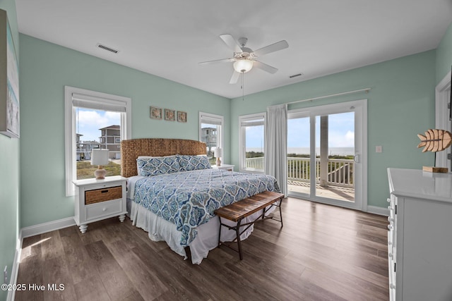 130 N Permuda Wynd Dr, North Topsail Beach, NC 28460 - bedroom featuring access to exterior, dark wood-style flooring, and baseboards