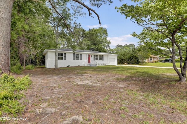 138 Navaho Trl, Wilmington, NC 28409 - single story home featuring a front lawn