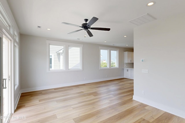 128 Sea Oaks Ct, North Topsail Beach, NC 28460 - unfurnished living room with recessed lighting, ceiling fan, light wood-style floors, and baseboards