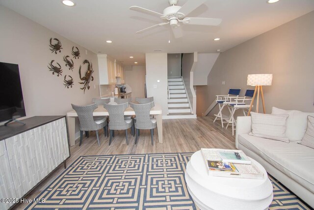 565 Salter Path Rd Unit S-5, Pine Knoll Shores, NC 28512 - living room featuring light wood-style floors, recessed lighting, a ceiling fan, stairs, and baseboards