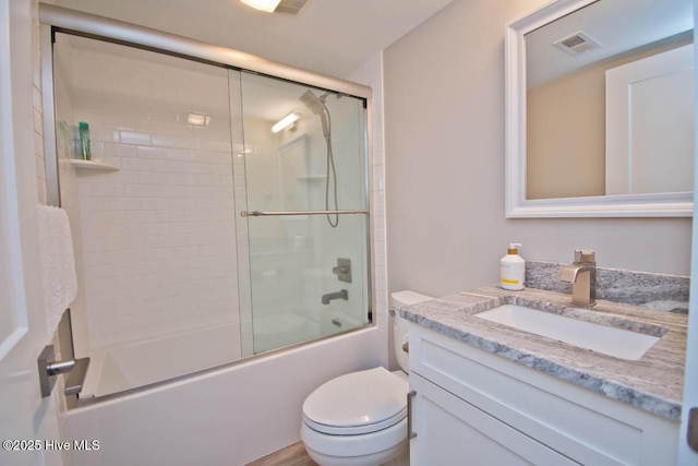 565 Salter Path Rd Unit S-5, Pine Knoll Shores, NC 28512 - full bath featuring vanity, toilet, and combined bath / shower with glass door
