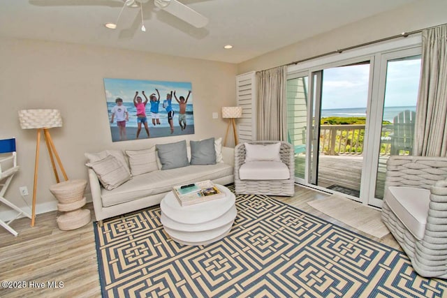 565 Salter Path Rd Unit S-5, Pine Knoll Shores, NC 28512 - living area with wood finished floors, ceiling fan, recessed lighting, and a water view