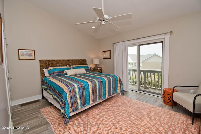 565 Salter Path Rd Unit S-5, Pine Knoll Shores, NC 28512 - bedroom with access to exterior, wood finished floors, vaulted ceiling, baseboards, and ceiling fan