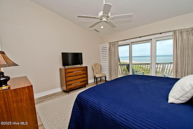 565 Salter Path Rd Unit S-5, Pine Knoll Shores, NC 28512 - bedroom with access to exterior, wood finished floors, baseboards, vaulted ceiling, and a ceiling fan