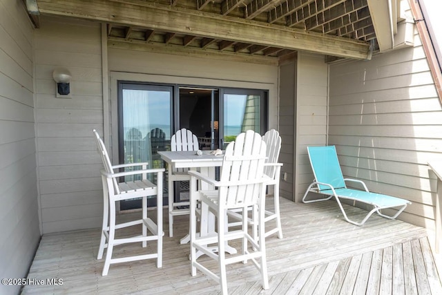 565 Salter Path Rd Unit S-5, Pine Knoll Shores, NC 28512 - wooden deck featuring outdoor dining space