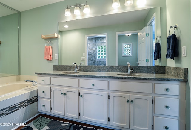 265 Creek View Dr, Sunset Beach, NC 28468 - bathroom featuring a garden tub and double vanity
