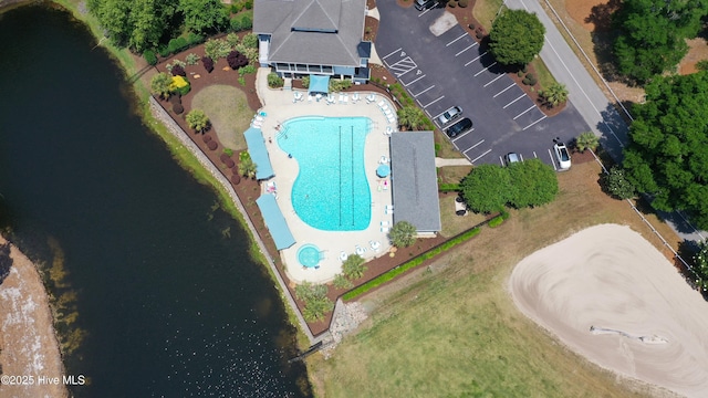 265 Creek View Dr, Sunset Beach, NC 28468 - aerial view of a pool and a nearby body of water