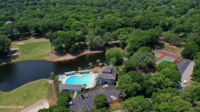 265 Creek View Dr, Sunset Beach, NC 28468 - view of property location featuring a nearby body of water, a pool area, and a forest