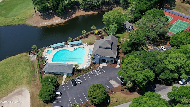 265 Creek View Dr, Sunset Beach, NC 28468 - drone / aerial view of a pool area and a nearby body of water