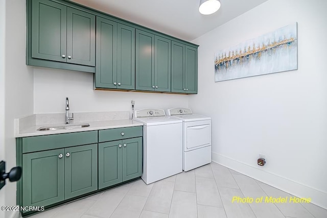 779 Breezewood Dr SE, Bolivia, NC 28422 - laundry area featuring cabinet space, washing machine and dryer, light tile patterned floors, and baseboards