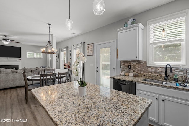 140 Timberwood Dr, Cameron, NC 28326 - kitchen with a sink, ceiling fan, dishwasher, white cabinets, and open floor plan