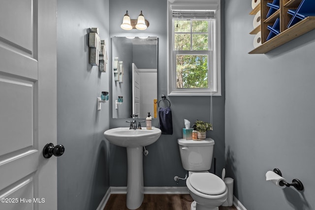 140 Timberwood Dr, Cameron, NC 28326 - half bath with toilet, baseboards, and wood finished floors