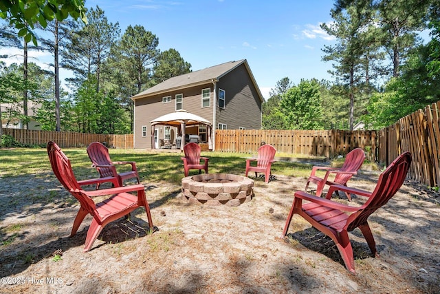 140 Timberwood Dr, Cameron, NC 28326 - view of patio featuring an outdoor fire pit, a fenced backyard, and a gazebo