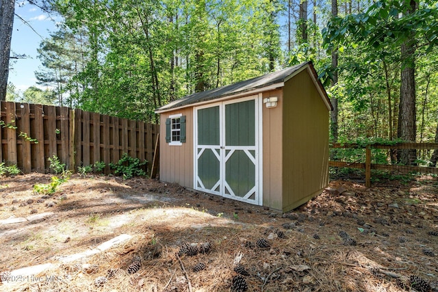 140 Timberwood Dr, Cameron, NC 28326 - view of shed with a fenced backyard