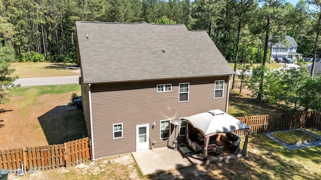 140 Timberwood Dr, Cameron, NC 28326 - rear view of house with a gazebo, a patio, a shingled roof, and a wooded view