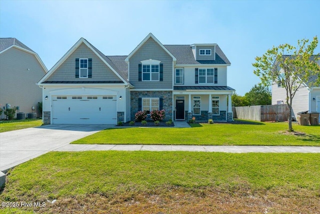 132 Turquoise Dr, Jacksonville, NC 28546 - craftsman-style home featuring stone siding, driveway, central AC, and a standing seam roof