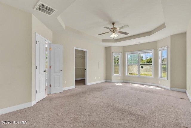 132 Turquoise Dr, Jacksonville, NC 28546 - unfurnished bedroom with a raised ceiling, carpet, and baseboards
