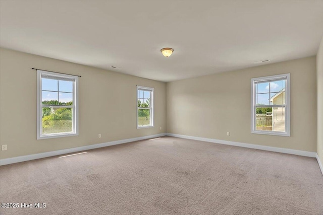 132 Turquoise Dr, Jacksonville, NC 28546 - carpeted empty room featuring baseboards