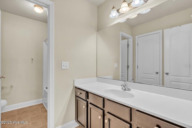 132 Turquoise Dr, Jacksonville, NC 28546 - bathroom featuring vanity, baseboards, and toilet