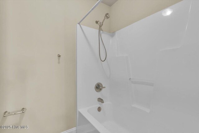 132 Turquoise Dr, Jacksonville, NC 28546 - full bath featuring shower / tub combination and baseboards