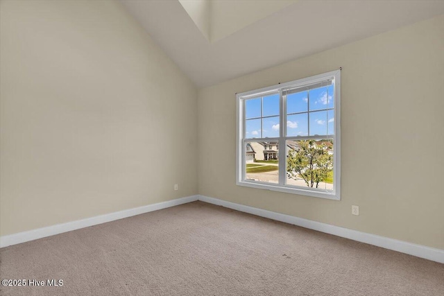 132 Turquoise Dr, Jacksonville, NC 28546 - empty room featuring vaulted ceiling, carpet flooring, and baseboards