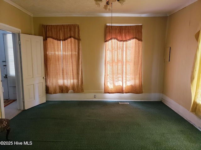 809 Conway Rd, Fair Bluff, NC 28439 - spare room with carpet floors, ornamental molding, plenty of natural light, and baseboards