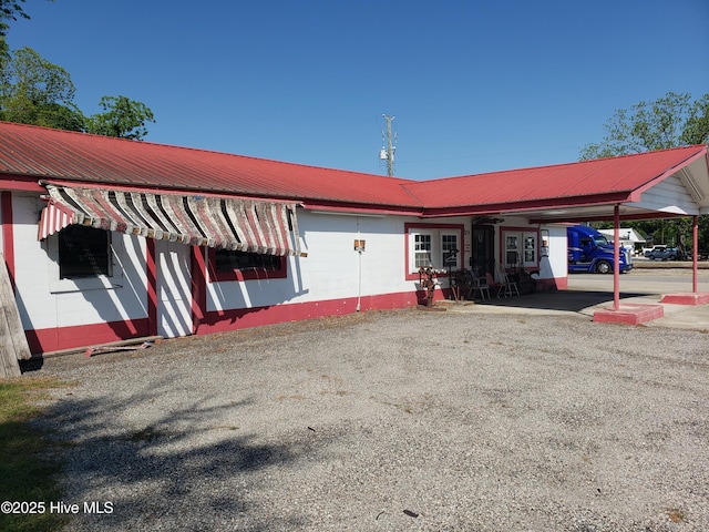 809 Conway Rd, Fair Bluff, NC 28439 - view of building exterior with a carport