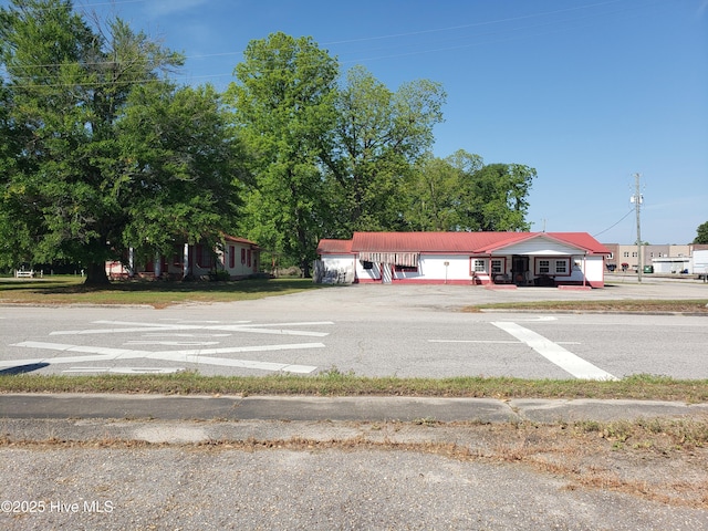 809 Conway Rd, Fair Bluff, NC 28439 - view of parking / parking lot featuring driveway and a carport