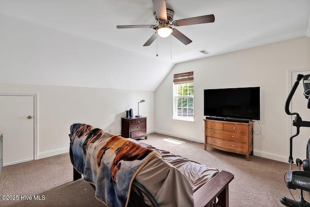 carpeted living room with vaulted ceiling, a ceiling fan, and baseboards