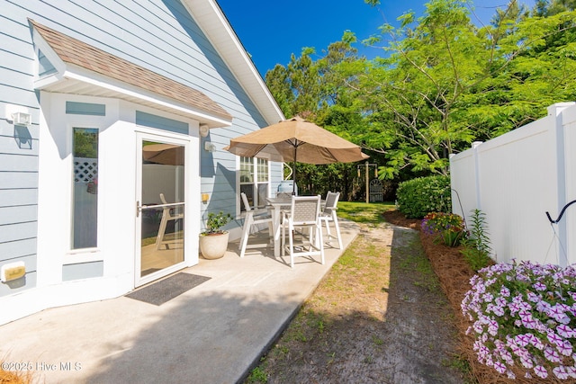view of yard with fence and a patio area