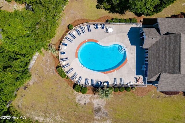 drone / aerial view of a pool