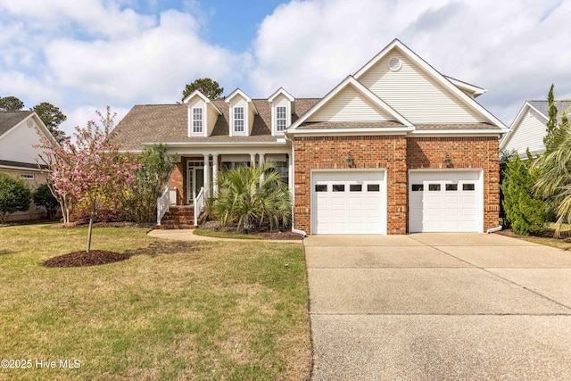 2016 Ashbrook Ct, Leland, NC 28451 - traditional-style home featuring driveway, brick siding, a front lawn, an attached garage, and roof with shingles