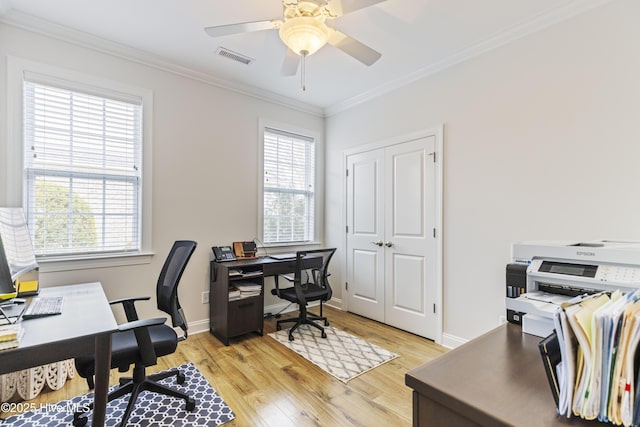 2016 Ashbrook Ct, Leland, NC 28451 - office area with crown molding, light wood-style floors, ceiling fan, and baseboards
