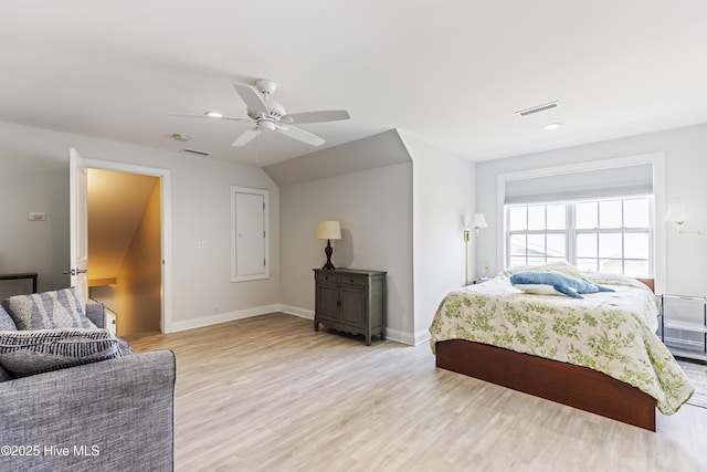 2016 Ashbrook Ct, Leland, NC 28451 - bedroom featuring light wood-type flooring, recessed lighting, ceiling fan, baseboards, and vaulted ceiling