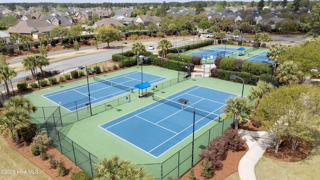 2016 Ashbrook Ct, Leland, NC 28451 - view of tennis court with fence, a residential view, and community basketball court