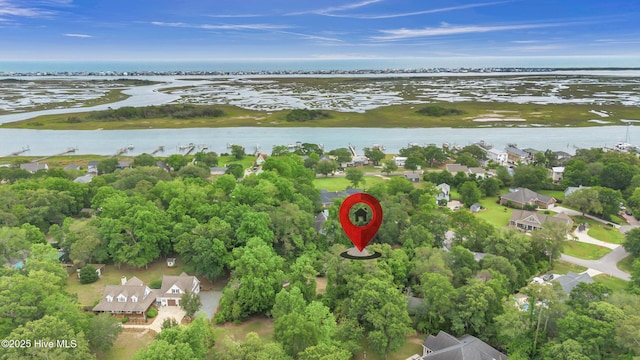 707 Brown Pelican Ln, Hampstead, NC 28443 - aerial perspective of suburban area with a large body of water