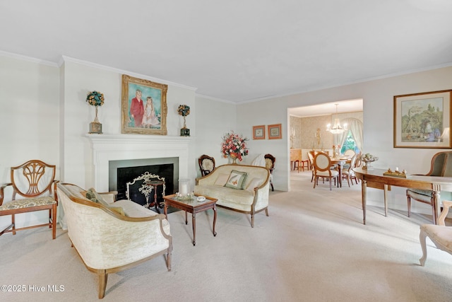 carpeted living room with a chandelier, ornamental molding, and a fireplace