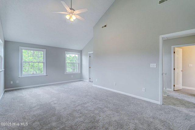 unfurnished room featuring high vaulted ceiling, a ceiling fan, baseboards, and carpet