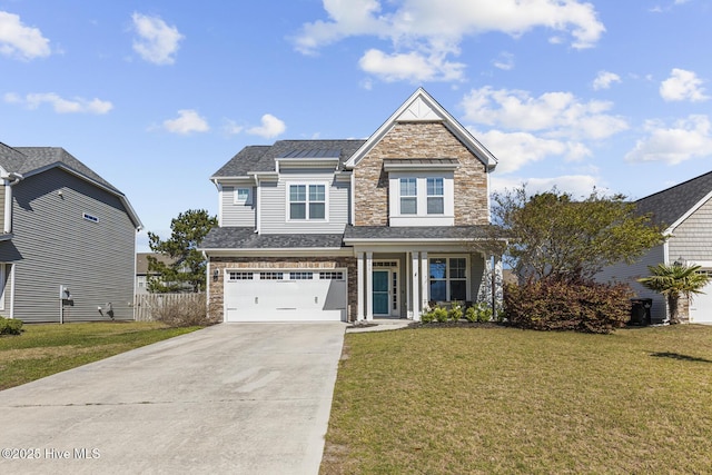 211 Willow Ridge Dr, Holly Ridge, NC 28445 - craftsman-style house featuring stone siding, concrete driveway, and a garage