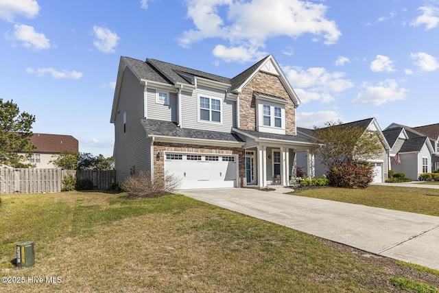 211 Willow Ridge Dr, Holly Ridge, NC 28445 - view of front of property with driveway, stone siding, and a garage