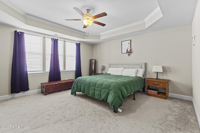 211 Willow Ridge Dr, Holly Ridge, NC 28445 - carpeted bedroom with ornamental molding, a tray ceiling, baseboards, and ceiling fan