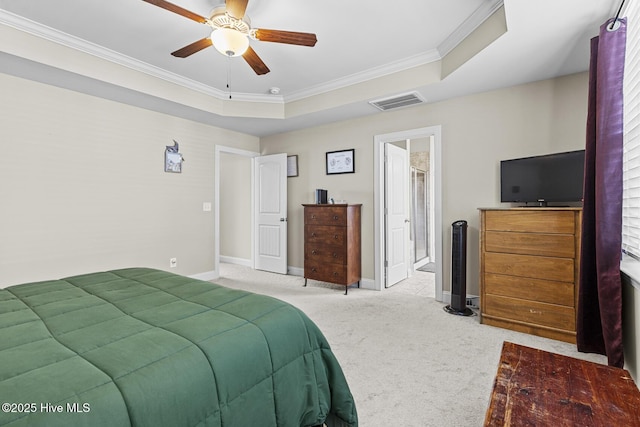 211 Willow Ridge Dr, Holly Ridge, NC 28445 - bedroom with carpet, ornamental molding, a tray ceiling, baseboards, and ceiling fan