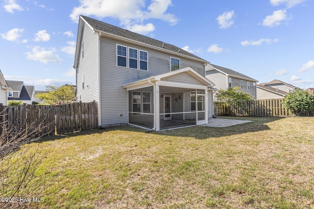 211 Willow Ridge Dr, Holly Ridge, NC 28445 - rear view of house with a sunroom and a patio area