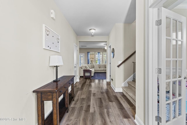 211 Willow Ridge Dr, Holly Ridge, NC 28445 - foyer featuring dark wood-type flooring, stairway, and baseboards