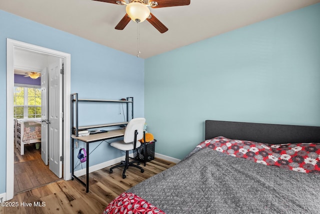 134 Inverness Dr, Hubert, NC 28539 - bedroom with wood finished floors, baseboards, and a ceiling fan